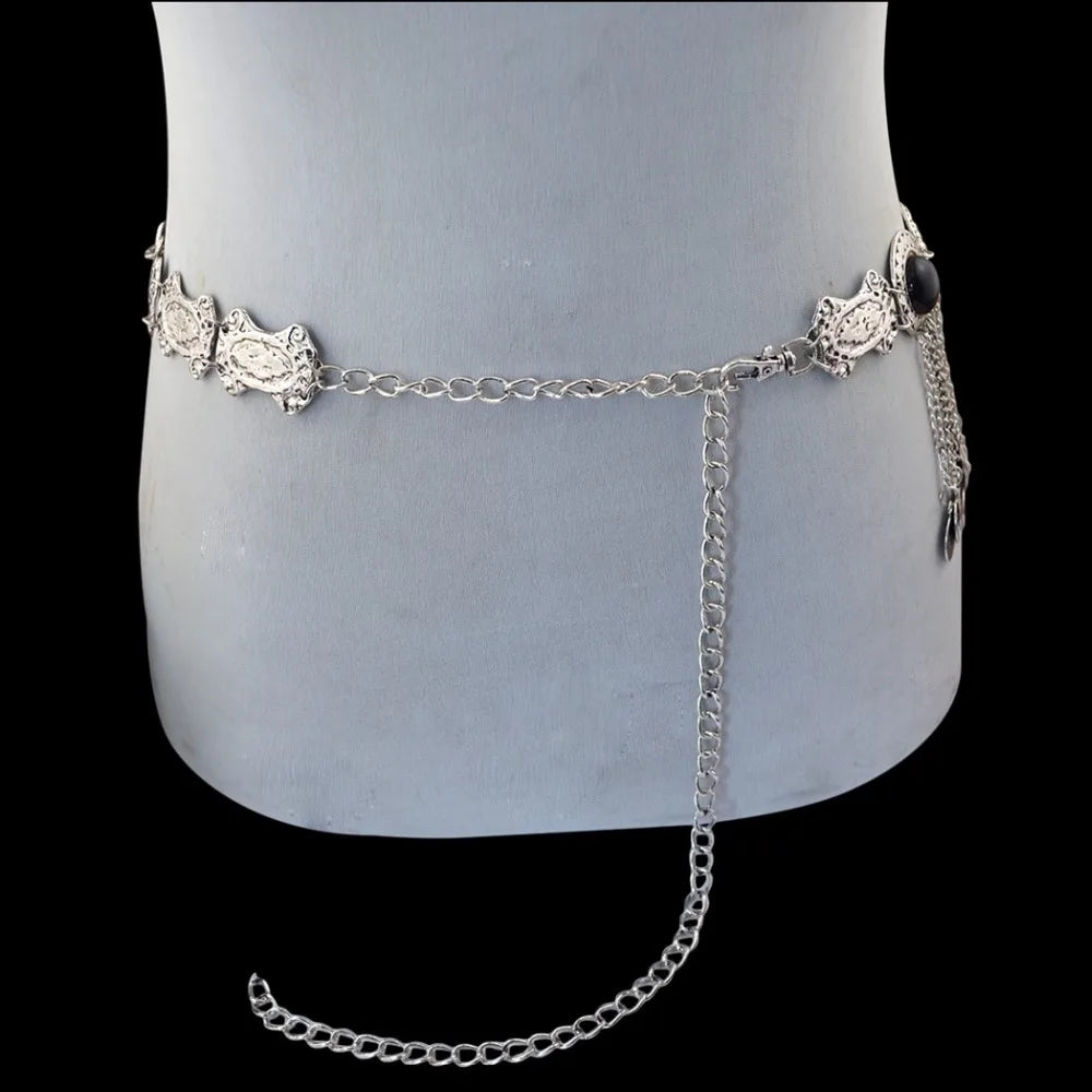 Silver waist chain belt with ornate metal links on mannequin, adjustable fashion accessory