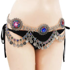 Colorful belly dance coin hip belt with gemstones worn over black bikini bottoms