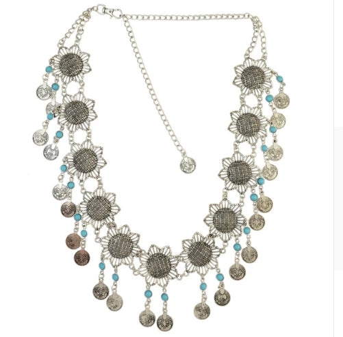 Boho silver coin necklace with floral medallions and turquoise bead accents