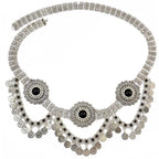 Silver coin choker necklace with black stone accents and ornate circular pendants.