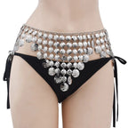 Silver coin belly dance hip scarf over black bikini bottoms, festival costume accessory.