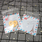 Self-Adhesive Bow-Knot Cookie Bags – 10x10cm Plastic Packaging for Parties