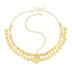 Gold coin choker necklace with adjustable chain and central crystal accent on white background