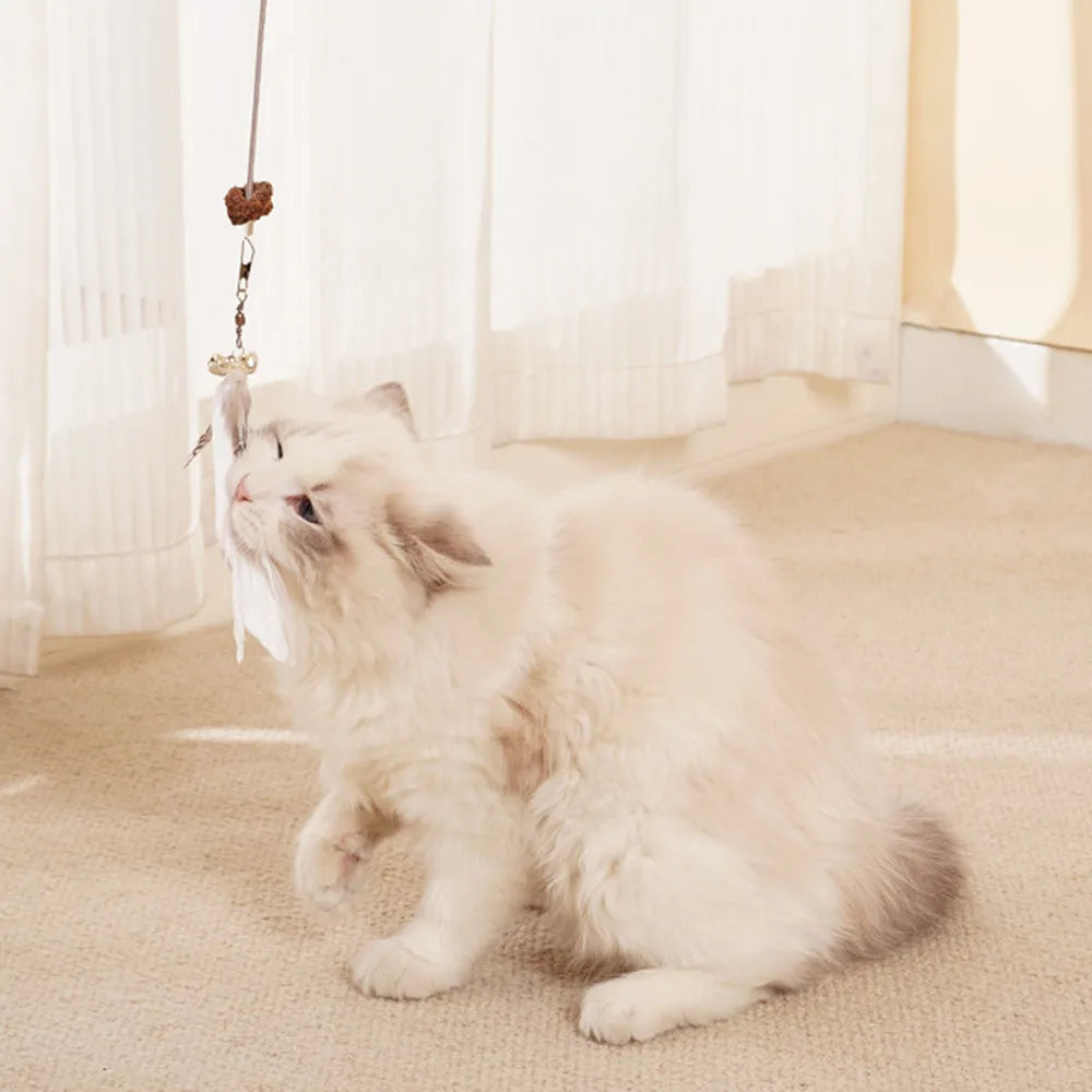 Interactive Cat Food Dispenser – Hanging Feather Toy for Kitten Enrichment
