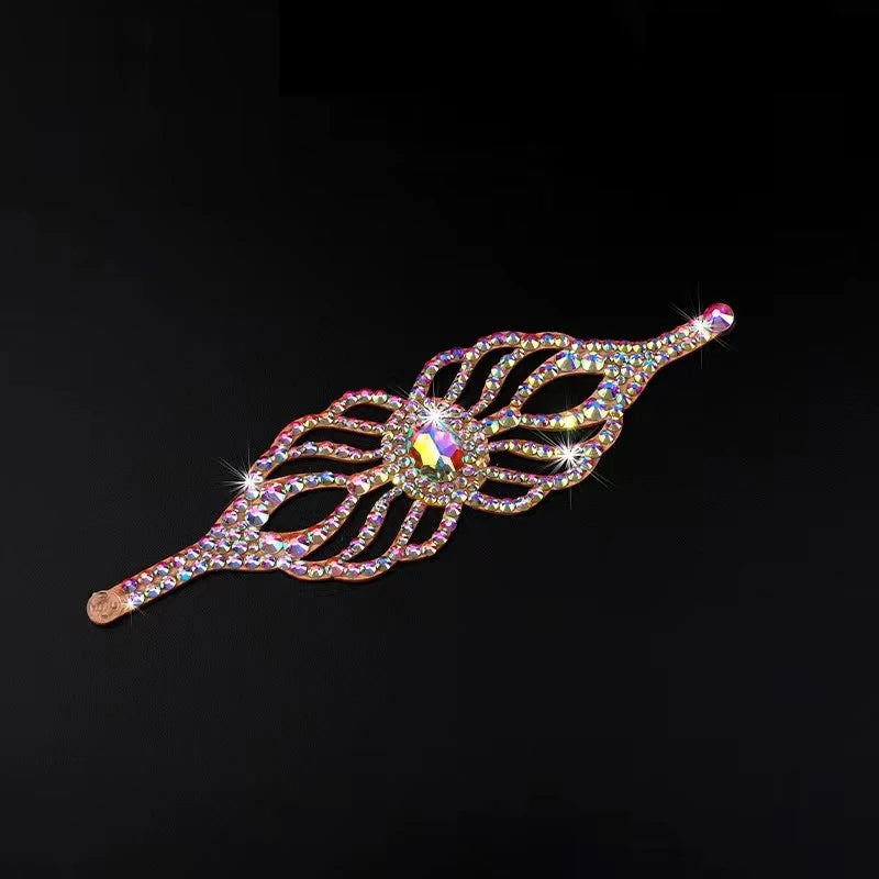 Iridescent rhinestone hair barrette with leaf design on black background