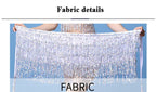 Hand holding a shimmering silver sequin fringe fabric panel for costumes or decor, blue background