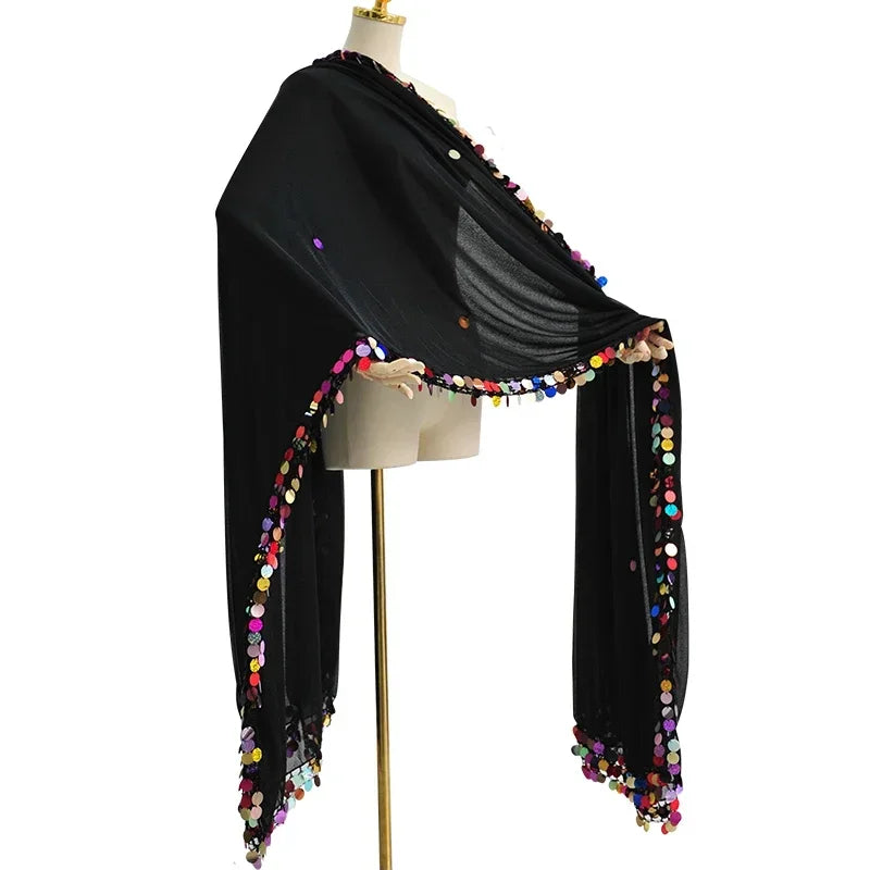Black lightweight shawl with colorful sequin trim displayed on a mannequin