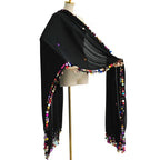 Black lightweight shawl with colorful sequin trim displayed on a mannequin