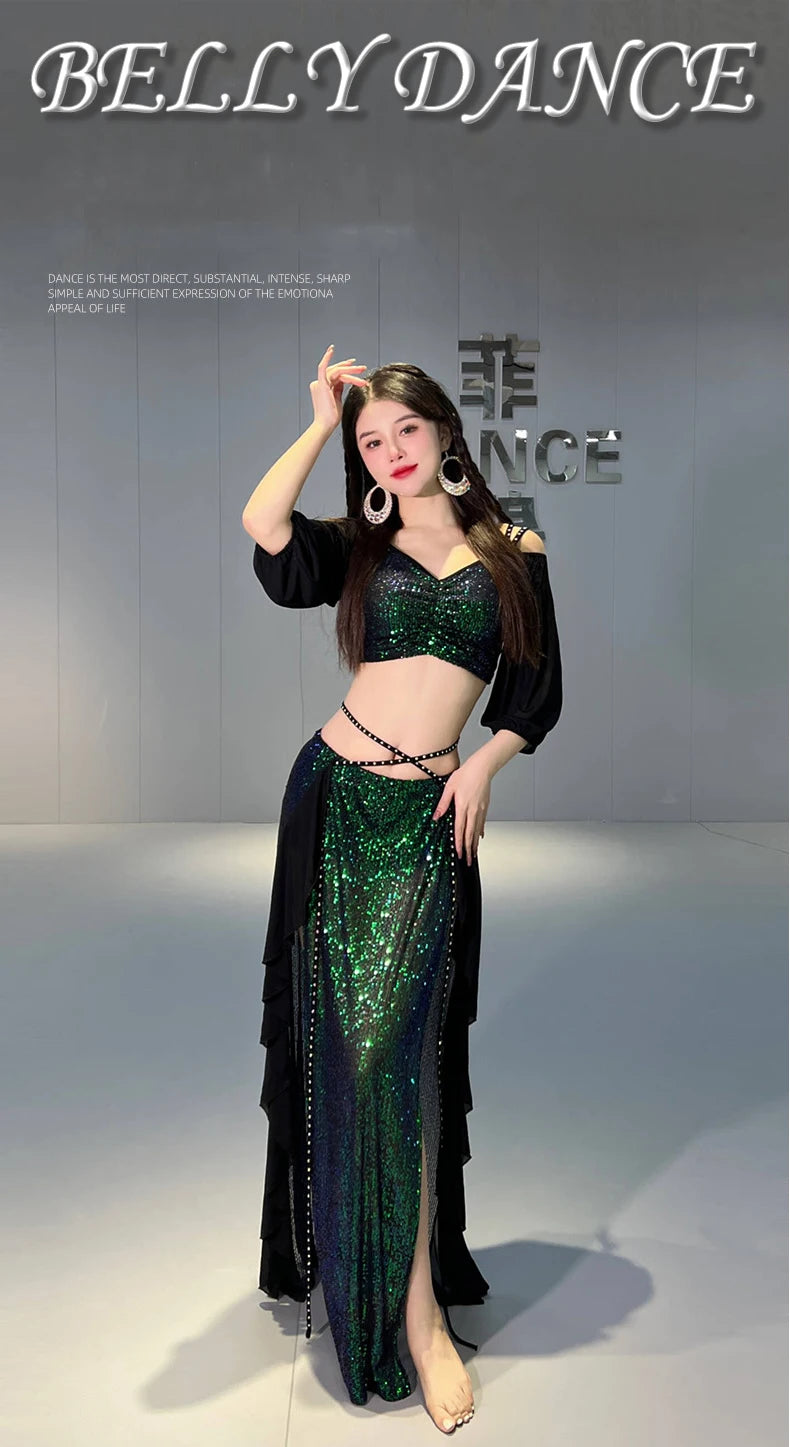 Woman wearing a green sequin belly dance costume with crop top and high-slit skirt