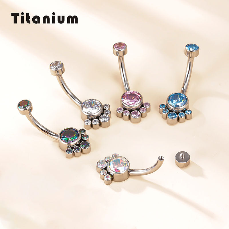 Titanium belly button rings with colorful gemstones, jewelry on light background