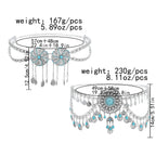 Silver western-style belts with turquoise accents, intricate floral designs, and hanging charms, with size and weight measurements.