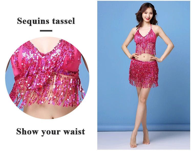 Woman wearing pink sequin tassel dance outfit with halter top and skirt, showing waist detail.