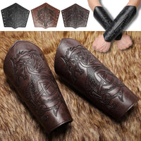 Viking style leather bracers with embossed dragon design in brown and black colors on fur