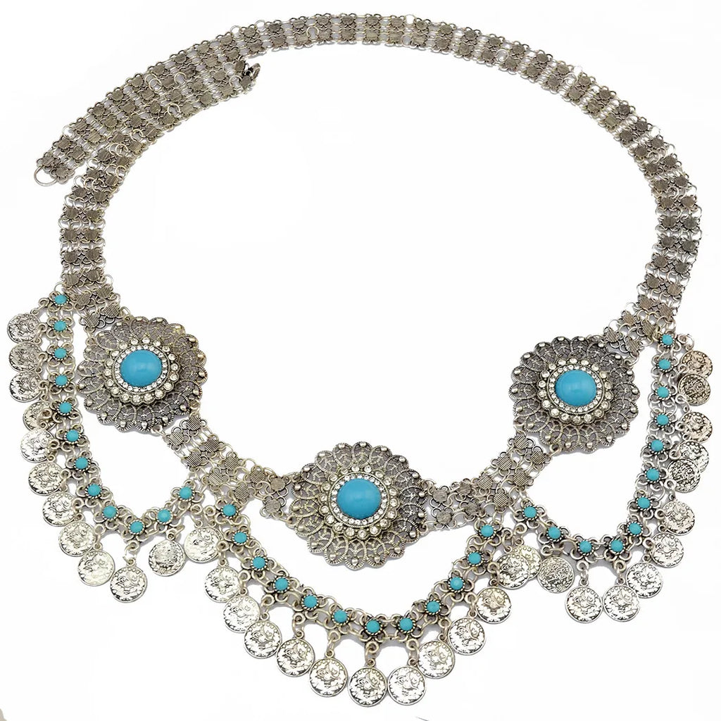 Boho silver coin belt with turquoise accents and floral medallion designs, home decor accessory