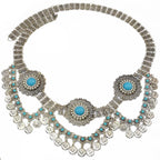 Boho silver coin belt with turquoise accents and floral medallion designs, home decor accessory