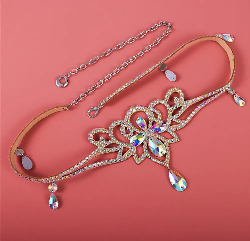 Rhinestone crystal choker necklace with teardrop gems on pink background