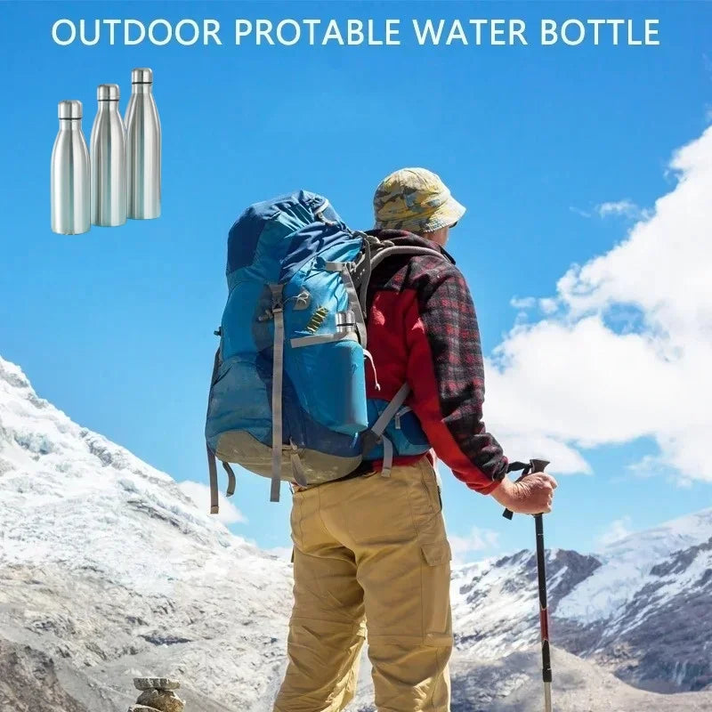 Hiker with backpack and trekking pole in mountains, stainless steel outdoor water bottles shown.