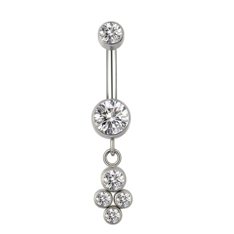 Silver belly button ring with clear cubic zirconia gems and dangle cluster design on white background.