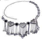 Antique silver coin belt with ornate metalwork and black stone accents, boho jewelry accessory