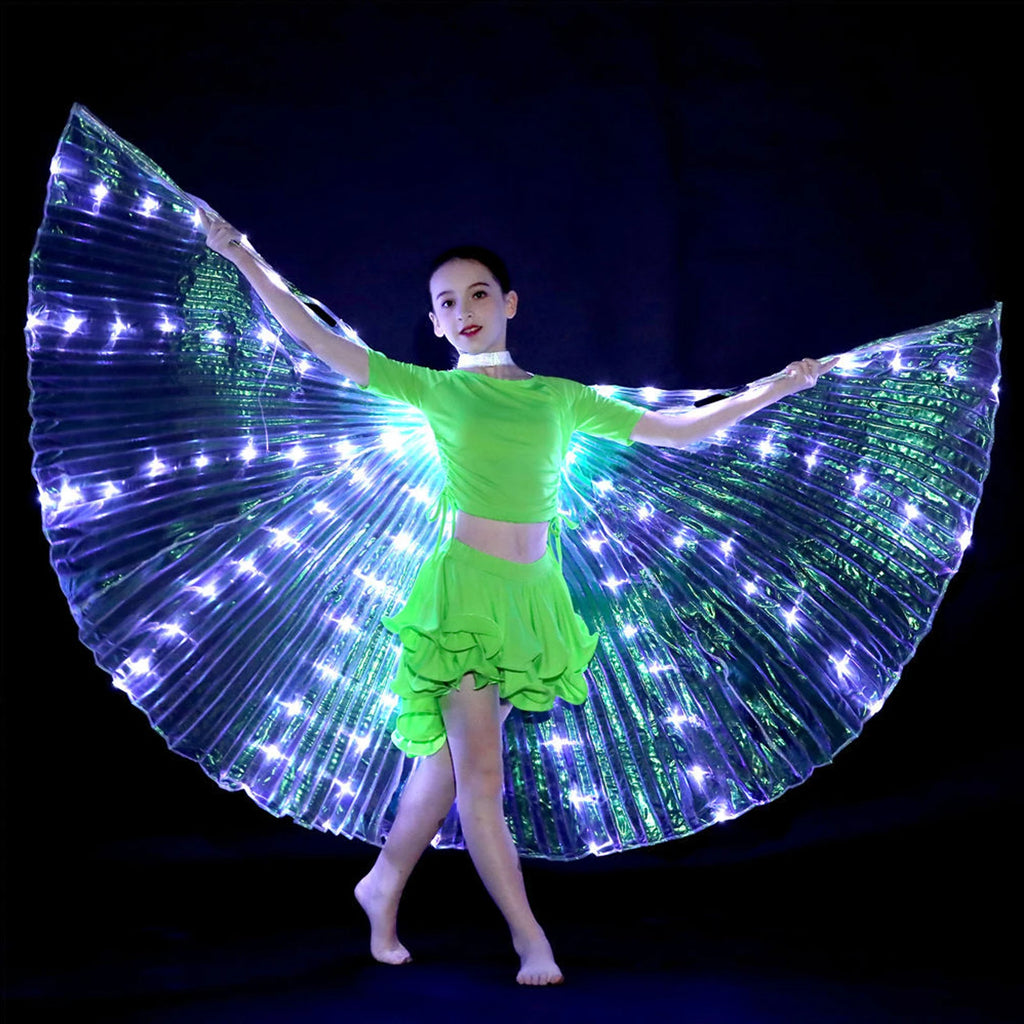 Child in green dance costume with illuminated LED butterfly wings performing on stage