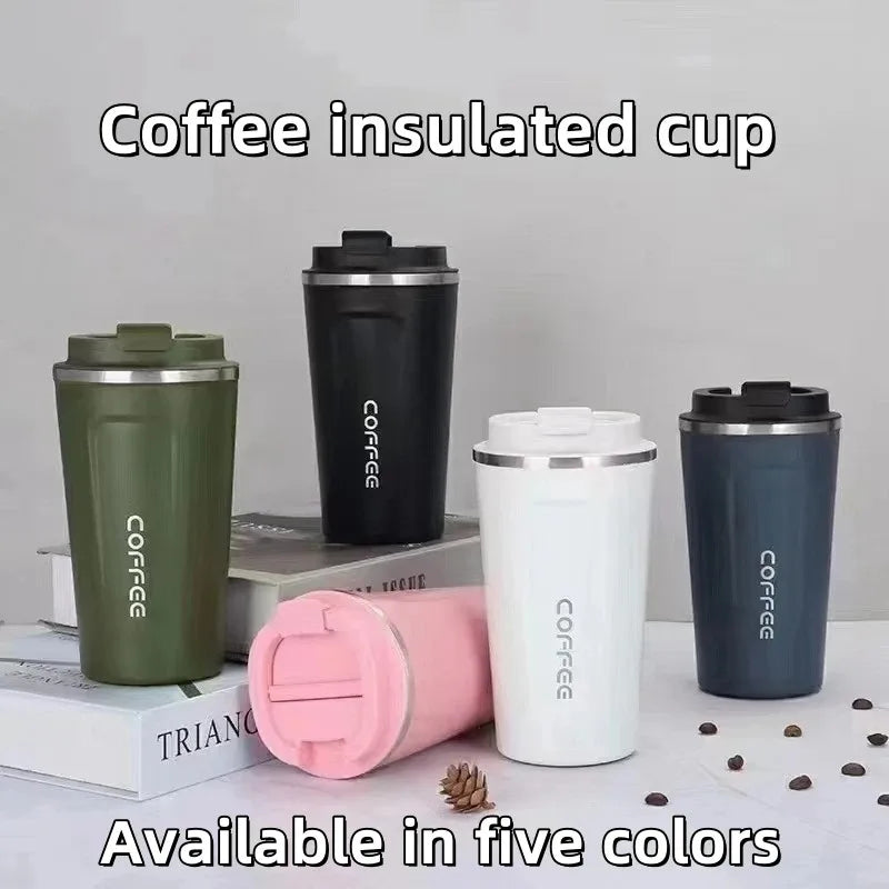 Insulated coffee cups in black, white, green, pink, and blue, displayed on table.