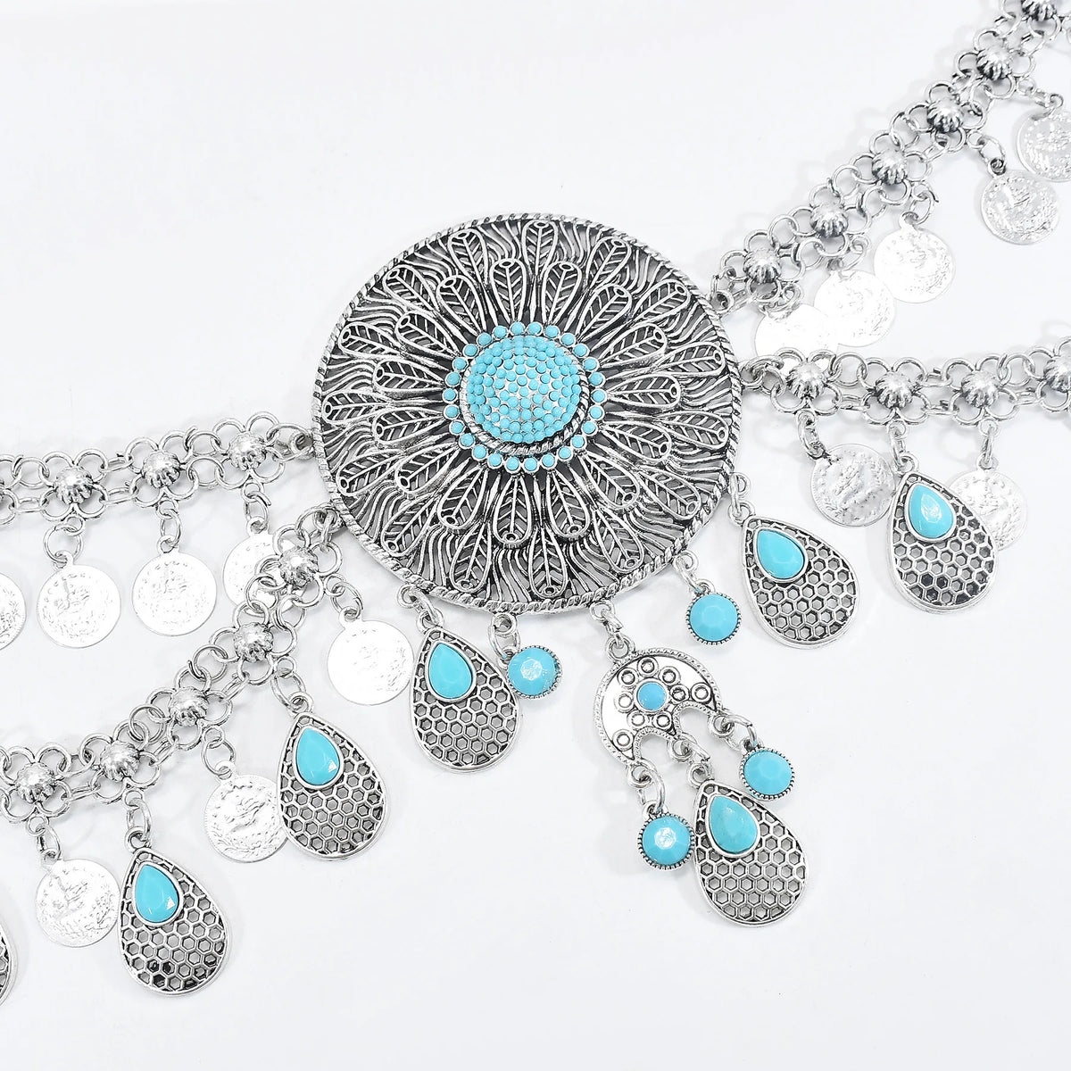 Boho silver statement necklace with turquoise stones and dangling coin charms