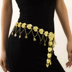Gold coin chain waist belt with dangling charms on black dress, boho fashion accessory