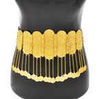 Gold waist belt with ornate engravings and dangling coin chains on mannequin torso