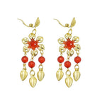Gold floral dangle earrings with red beads and leaf charms