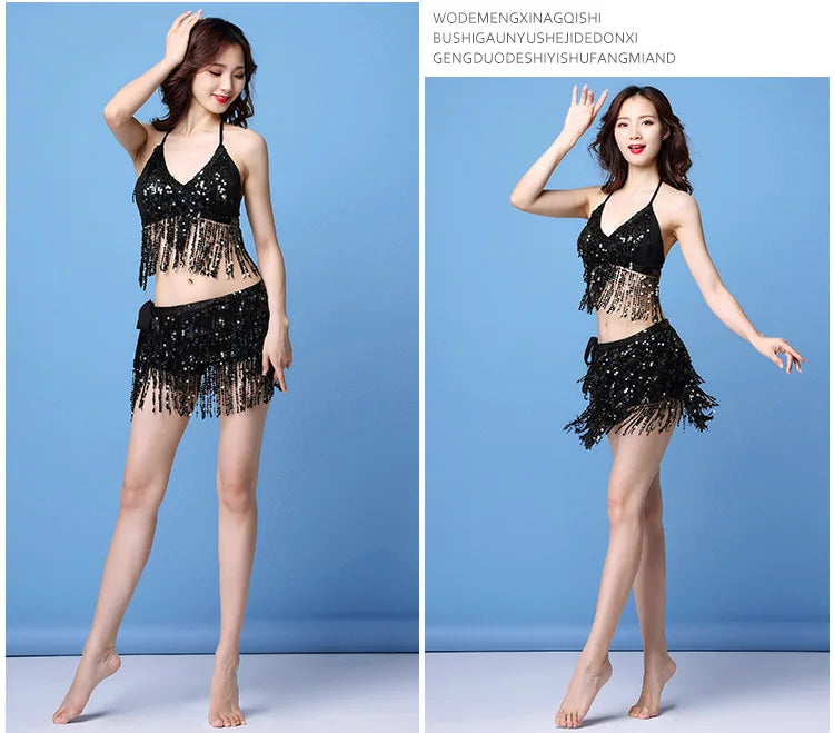 Woman modeling black sequin fringe two-piece dance costume against blue background