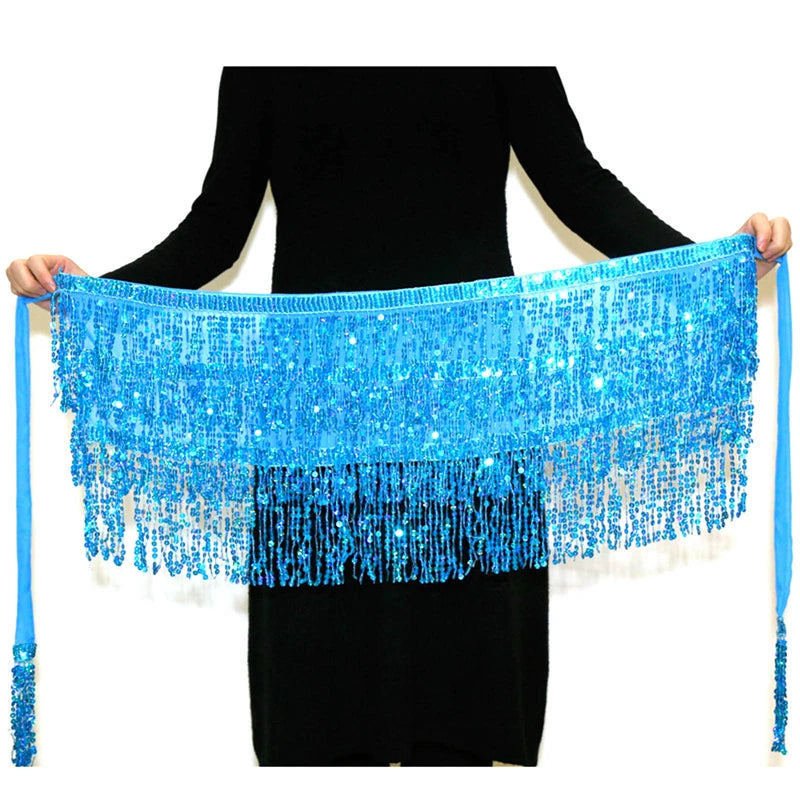 Person holding blue sequin fringe hip scarf, belly dance costume accessory
