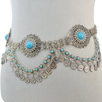 Boho silver coin belt with turquoise stones and intricate filigree, displayed on mannequin