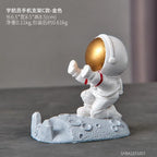 Nordic Astronaut Phone Stand – Spaceman Desk Holder for Office Decor Gifts