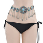 Boho turquoise belly chain with dangling charms on model wearing black bikini bottom