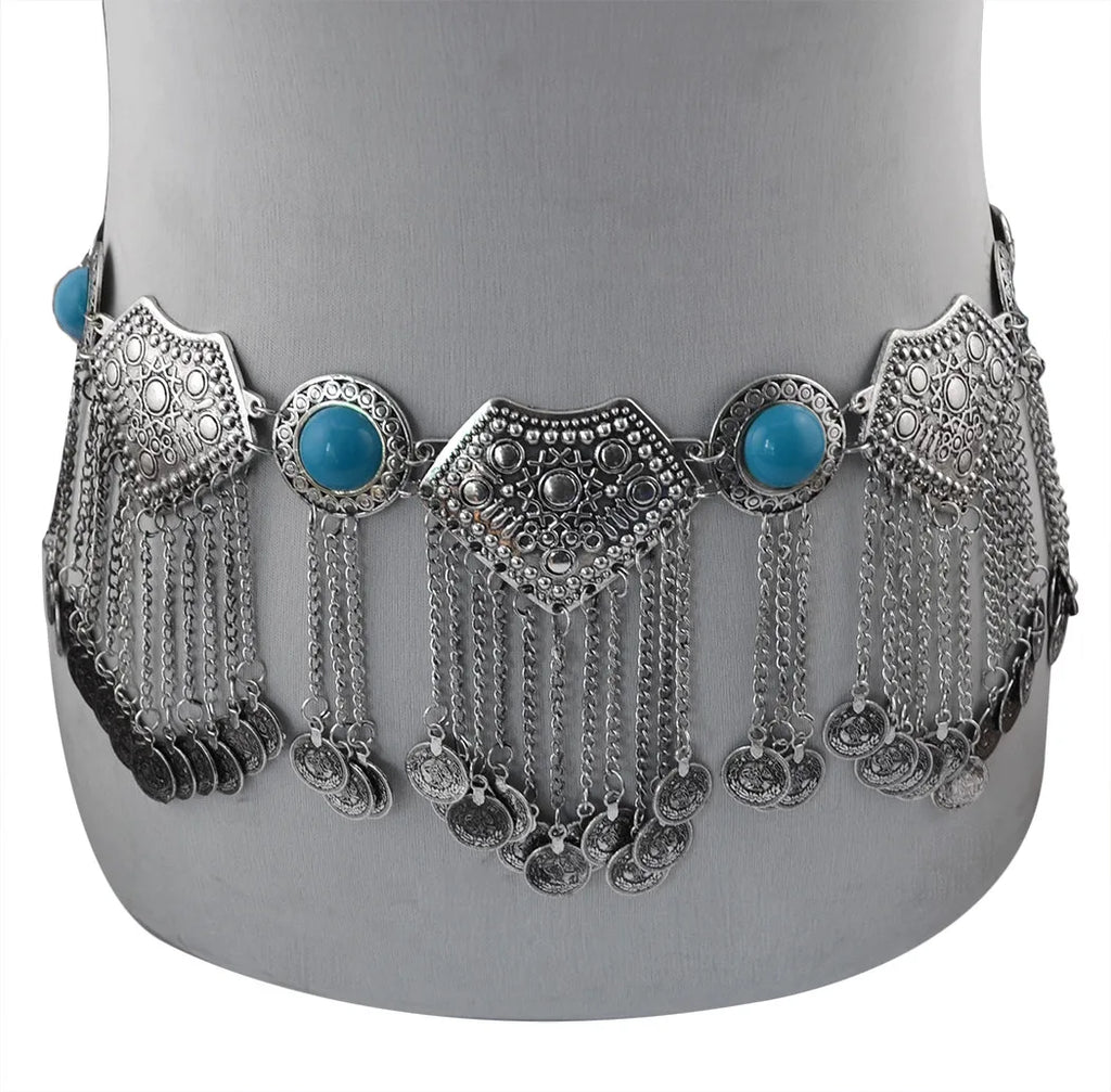 Silver boho coin belt with turquoise stones and dangling chain accents on mannequin.