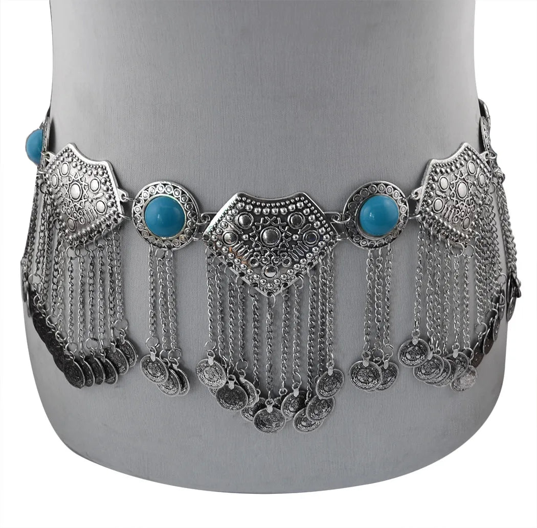 Silver boho coin belt with turquoise stones and dangling chain accents on mannequin.