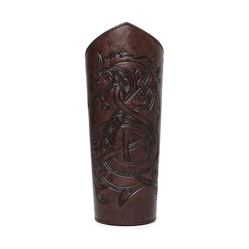 Brown leather bracer with embossed Celtic dragon design, medieval costume accessory