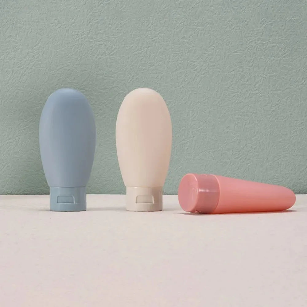 Refillable Travel Bottle Set – 60ml Squeeze Tubes for Cosmetic Toiletries