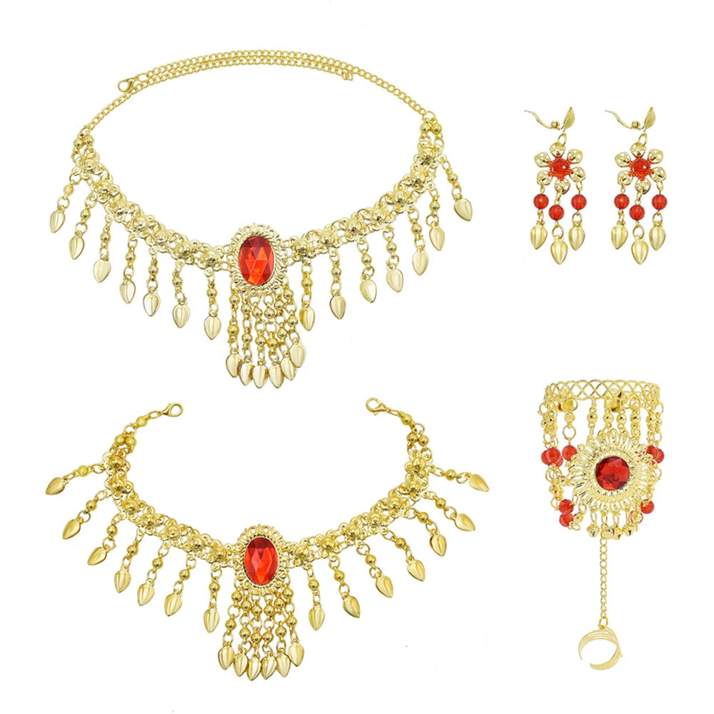 Gold jewelry set with red gemstones including necklace, earrings, bracelet, and hand chain