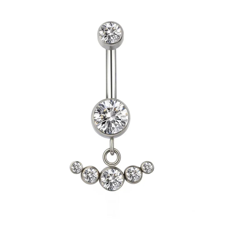 Silver belly button ring with clear cubic zirconia crystals in a crown design on white background.