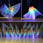 Children performing in illuminated LED light up butterfly wings costumes, colorful dance outfits