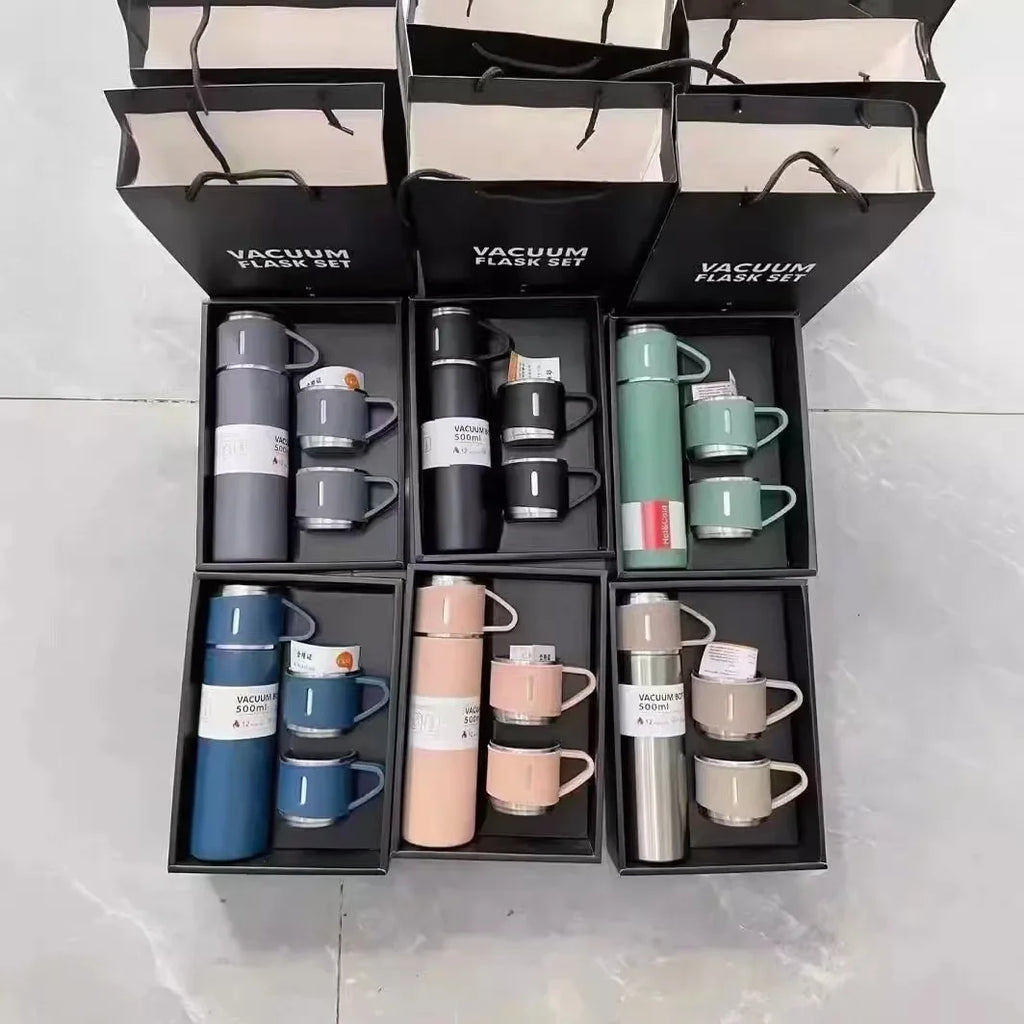 Assorted vacuum flask and mug gift sets in various colors with black packaging bags.