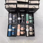 Assorted vacuum flask and mug gift sets in various colors with black packaging bags.