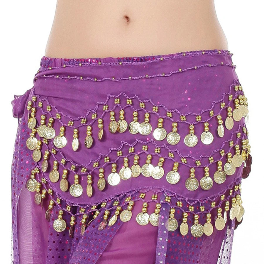 Purple belly dance hip scarf with gold coins and sequins on a person's waist