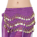 Purple belly dance hip scarf with gold coins and sequins on a person's waist