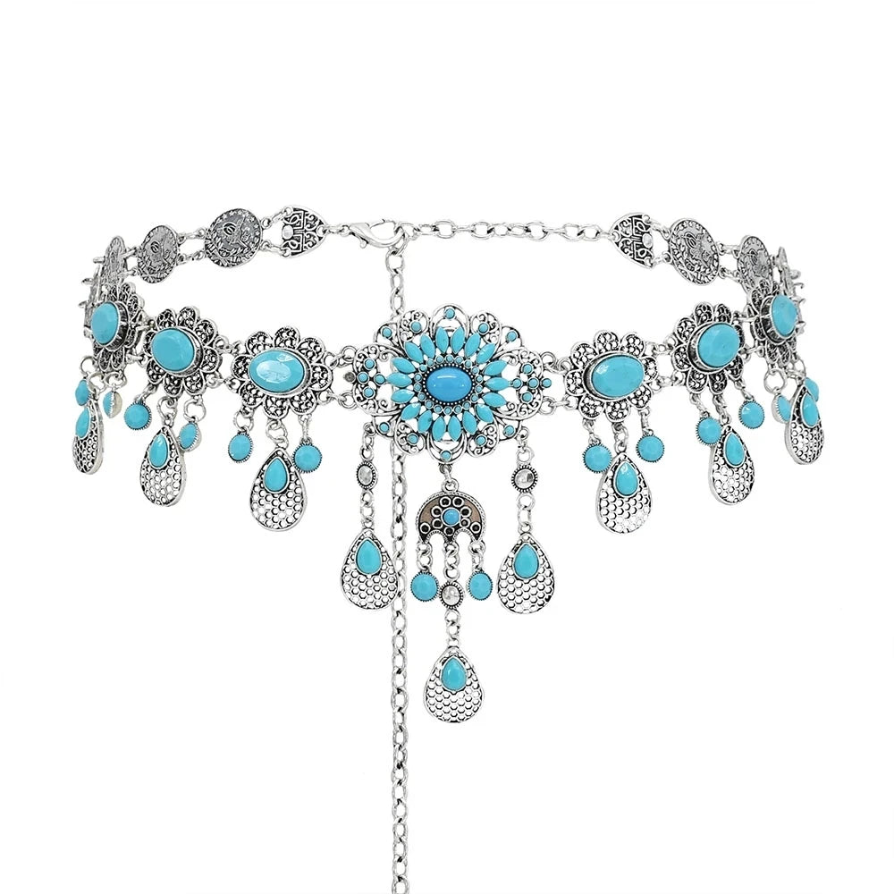 Boho silver chain belt with turquoise stones and ornate dangling charms, fashion accessory