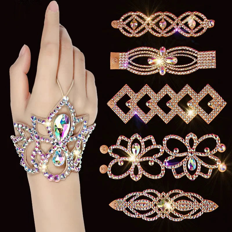 Hand wearing sparkling rhinestone bracelet with seven ornate crystal cuff designs on black.