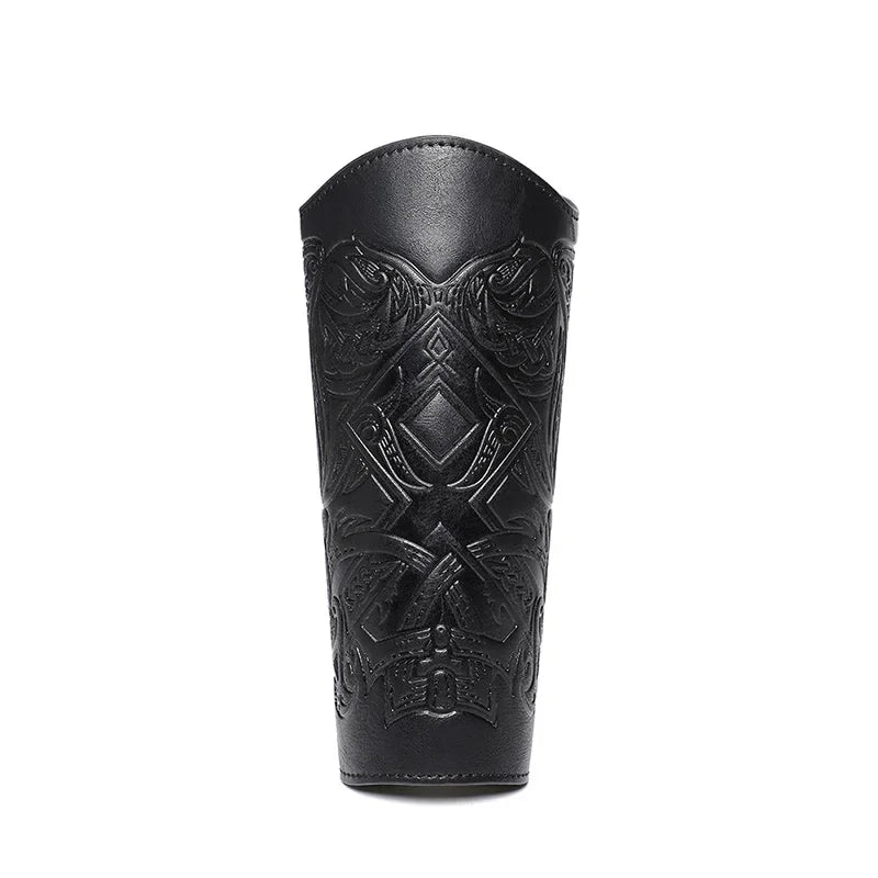 Black leather arm guard with intricate embossed Viking pattern, medieval costume accessory