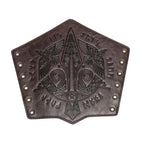 Dark brown leather panel with embossed Norse design, runes and bird motifs, lace-up edges