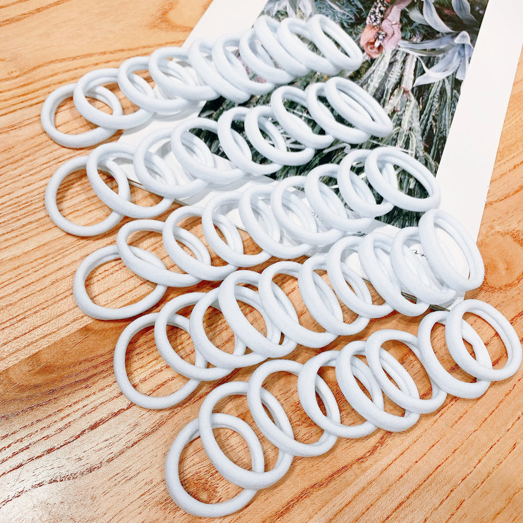Black Elastic Hair Bands – High Stretch Rubber Ties for Ponytail Styling